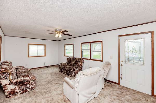 9.82 Acres of Land with Home for Sale in Peru Township, Iowa