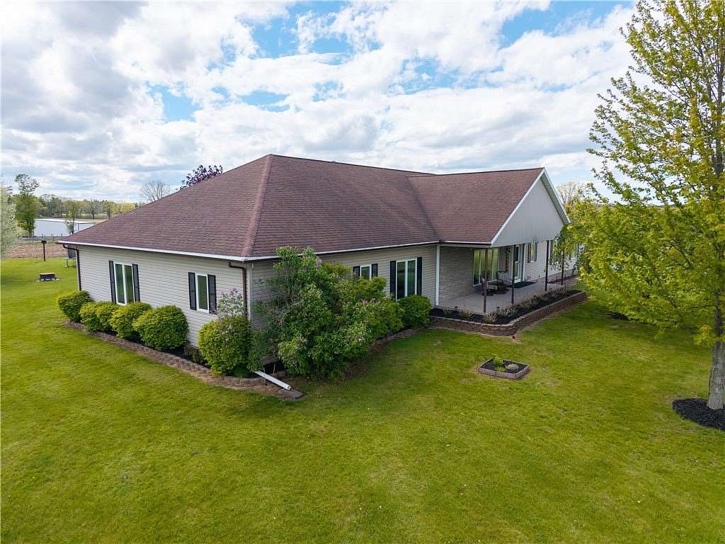 1.56 Acres of Land with Home for Sale in Scottsville, New York