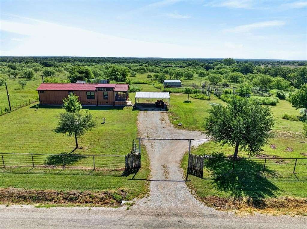 5 Acres of Land with Home for Sale in Mineral Wells, Texas
