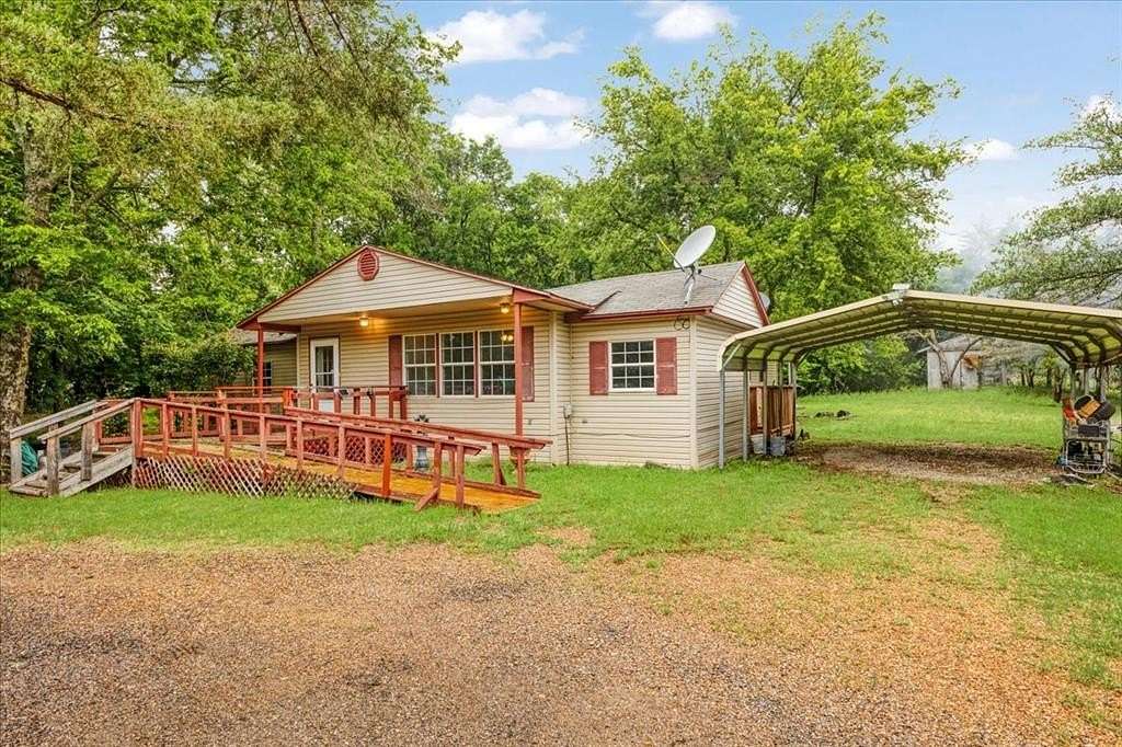 3.19 Acres of Land with Home for Sale in Quinlan, Texas