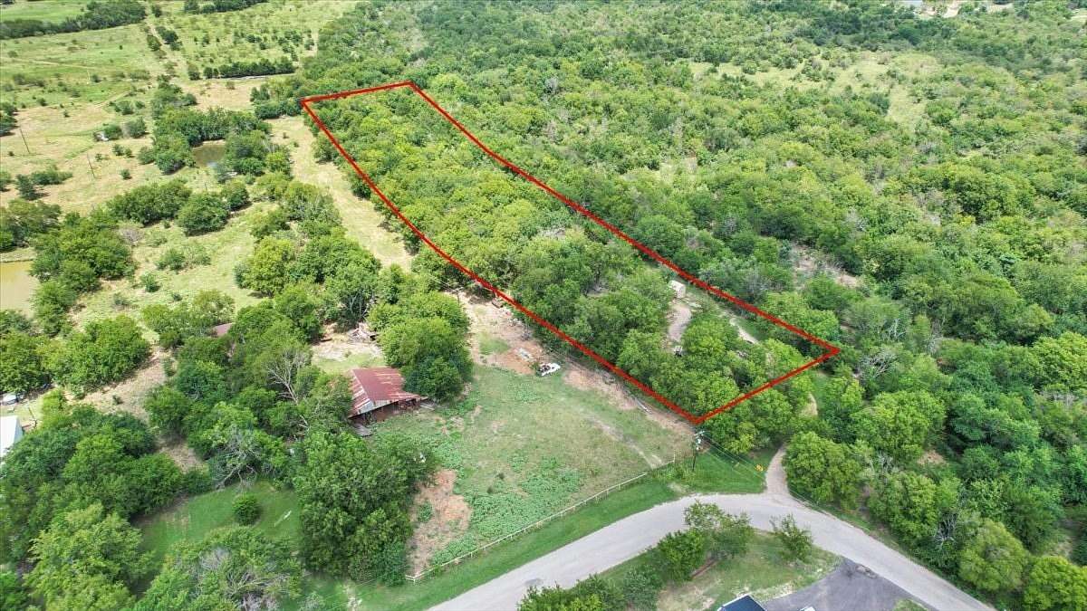 3.19 Acres of Land with Home for Sale in Quinlan, Texas