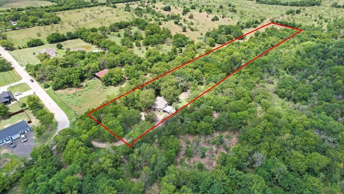 3.19 Acres of Land with Home for Sale in Quinlan, Texas