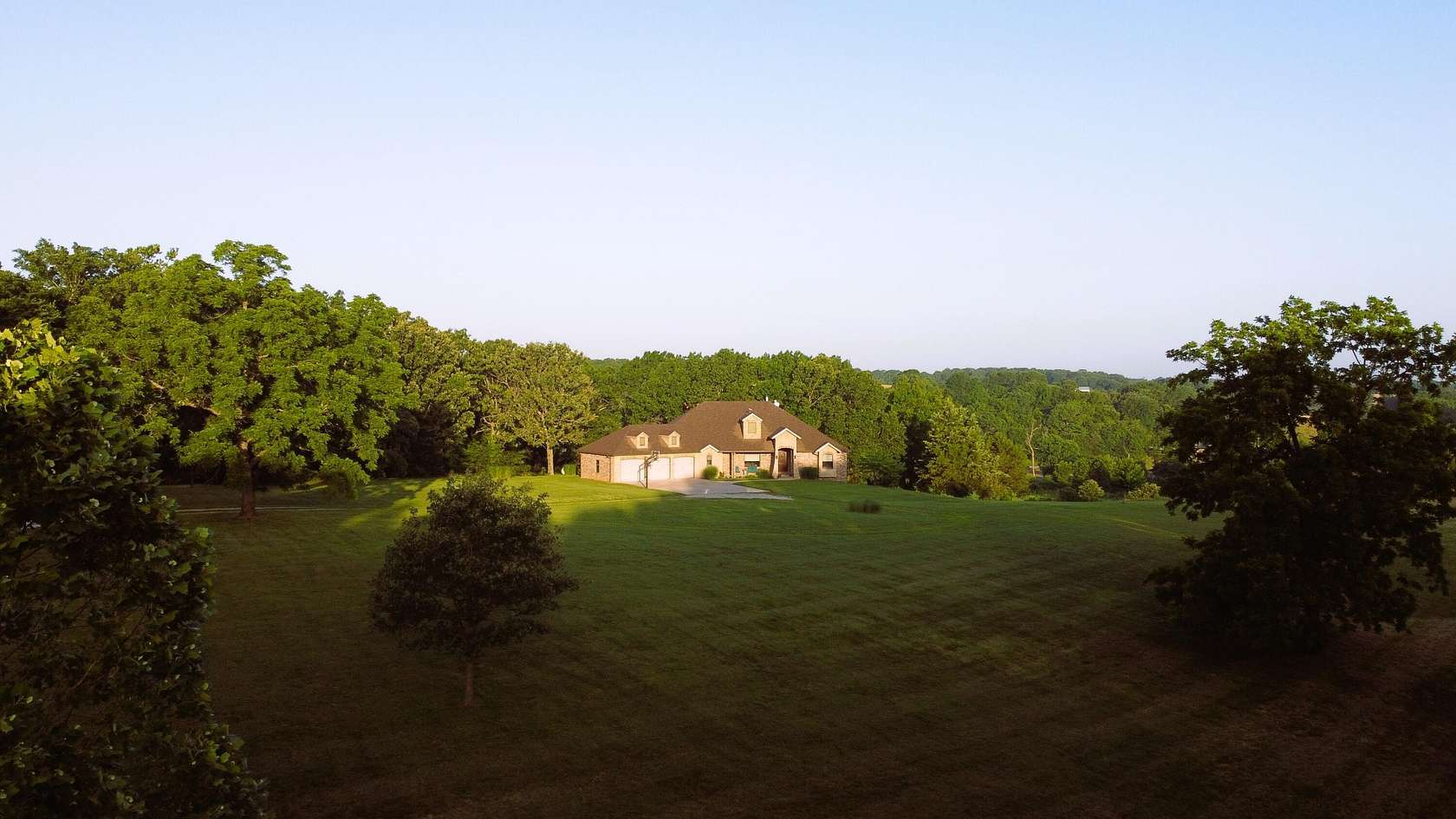 6.7 Acres of Land with Home for Sale in Bois D'Arc, Missouri