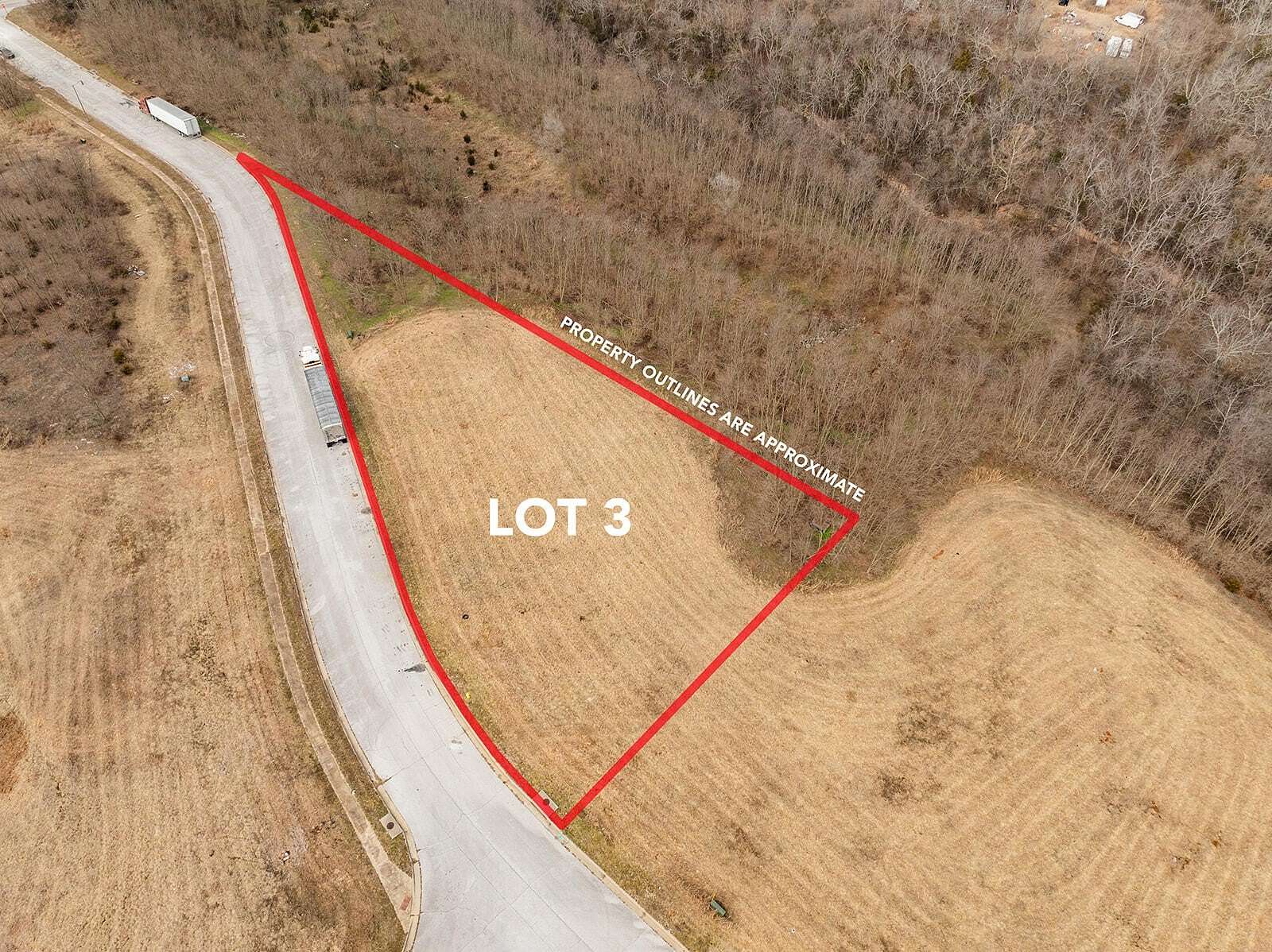 0.9 Acres of Commercial Land for Sale in Brookline, Missouri