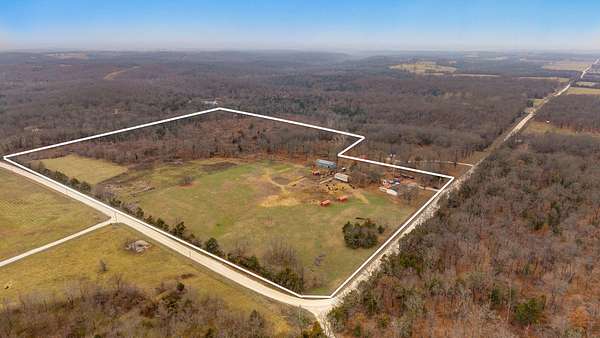 26 Acres of Agricultural Land with Home for Sale in Bolivar, Missouri
