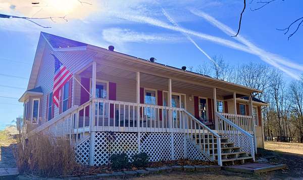 40 Acres of Land with Home for Sale in Mountain Grove, Missouri