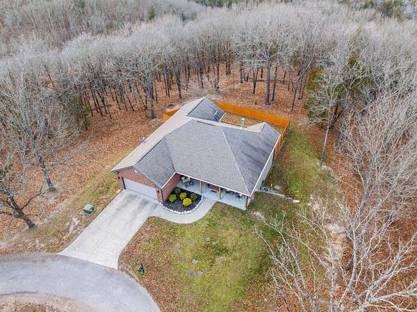 1.54 Acres of Land with Home for Sale in Blue Eye, Missouri