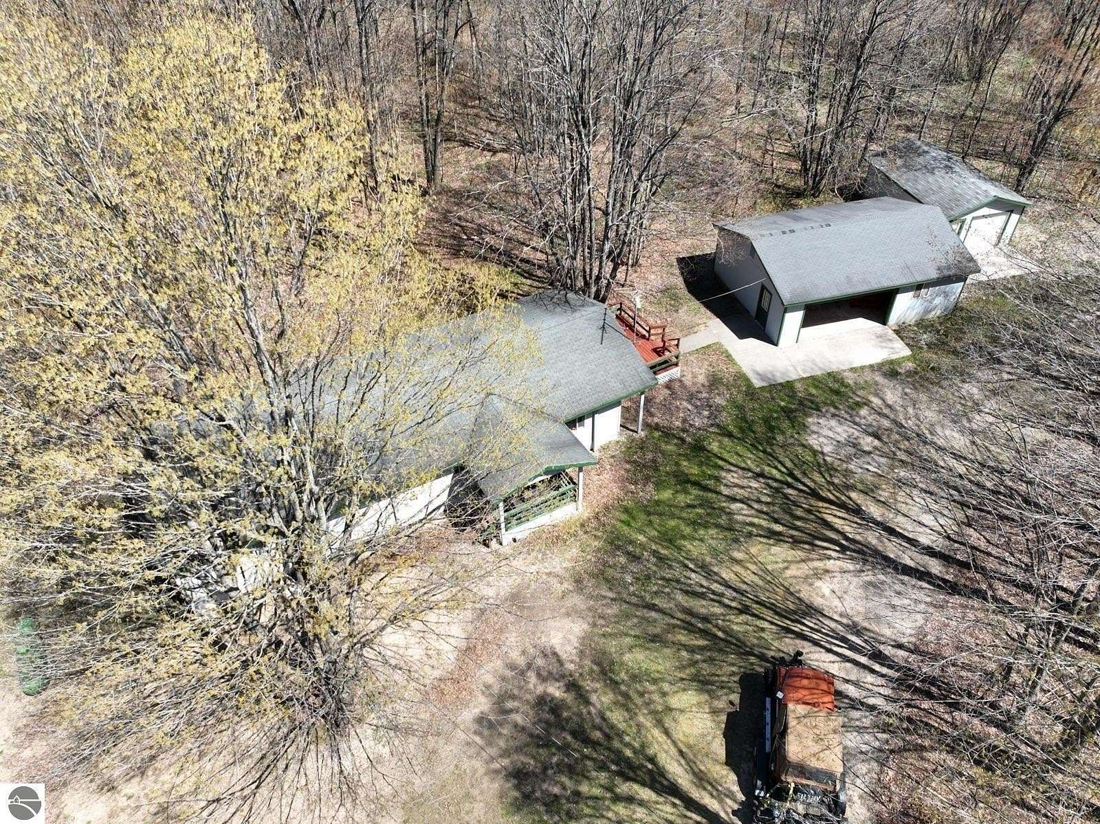 10 Acres of Land with Home for Sale in Mancelona, Michigan