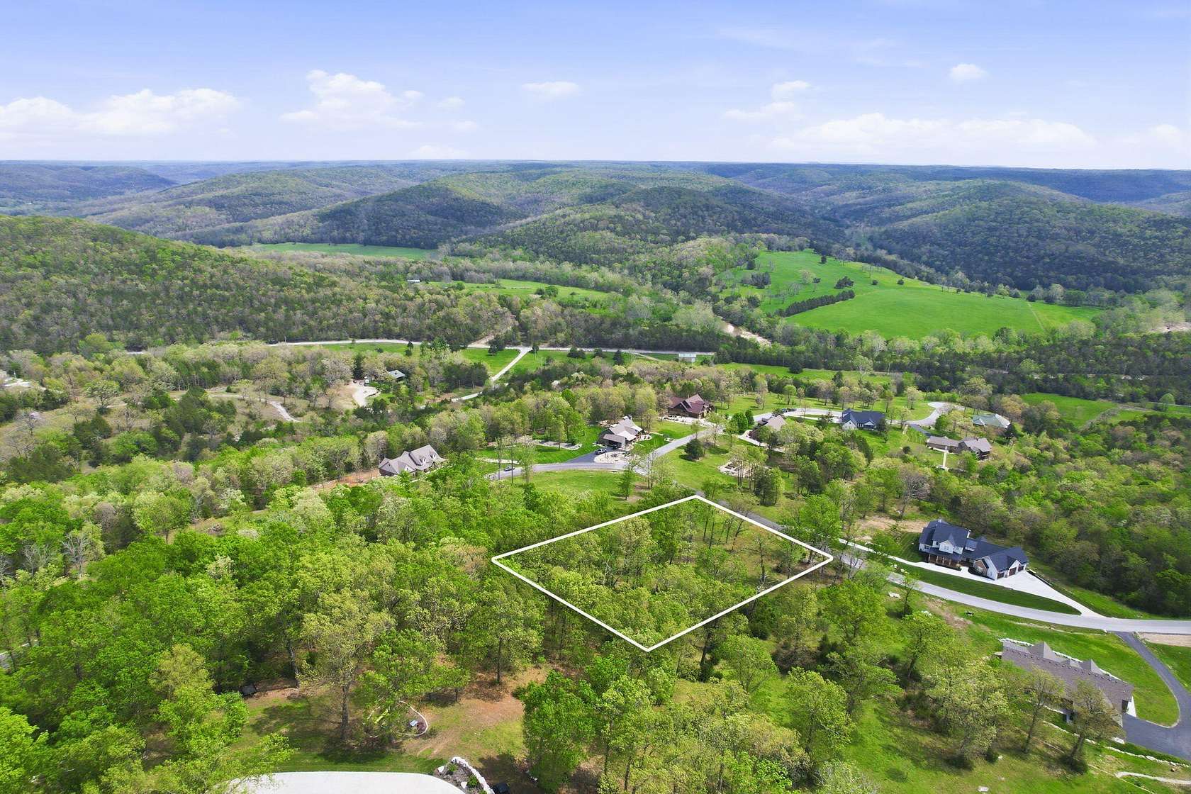 0.91 Acres of Residential Land for Sale in Saddlebrooke, Missouri
