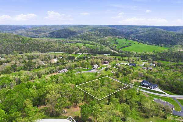 0.91 Acres of Residential Land for Sale in Saddlebrooke, Missouri