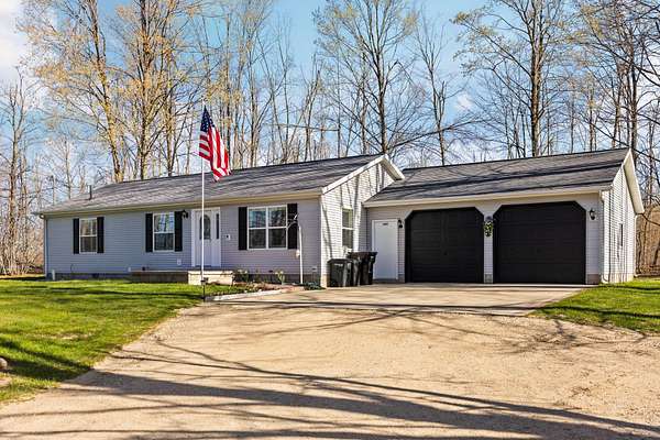 10 Acres of Recreational Land with Home for Sale in Gaylord, Michigan
