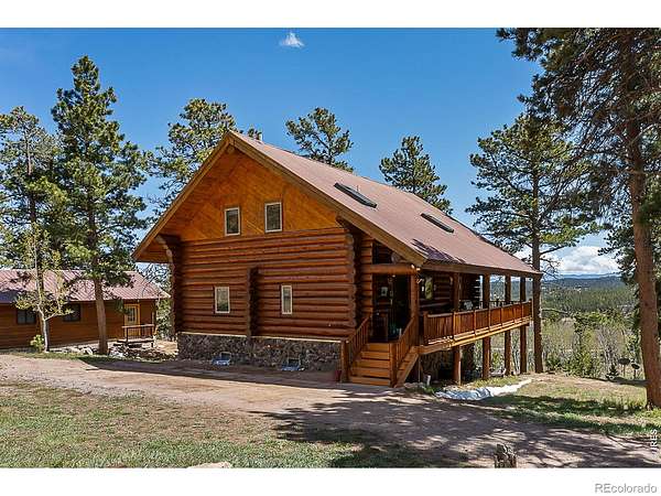 3.27 Acres of Land with Home for Sale in Red Feather Lakes, Colorado