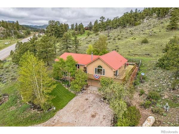 5.43 Acres of Land with Home for Sale in Red Feather Lakes, Colorado