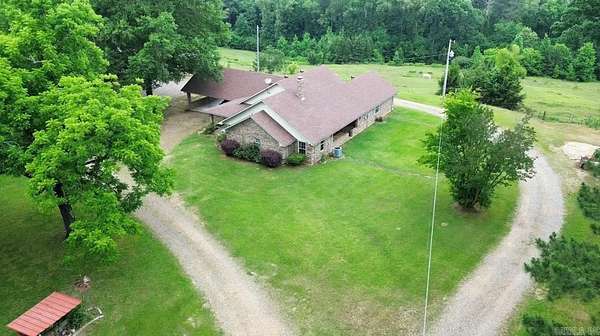 9.54 Acres of Land with Home for Sale in Lockesburg, Arkansas