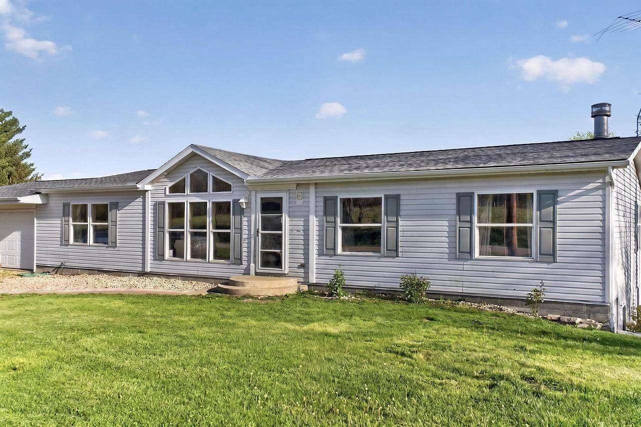 12.8 Acres of Land with Home for Sale in Pardeeville, Wisconsin