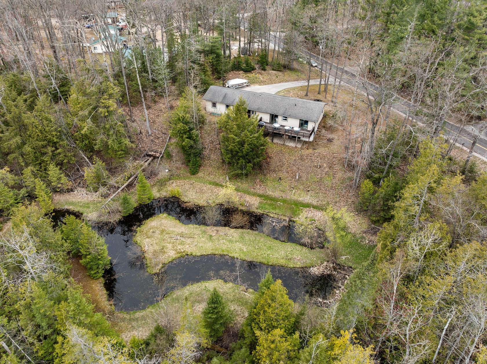 4.33 Acres of Land with Home for Sale in Indian River, Michigan