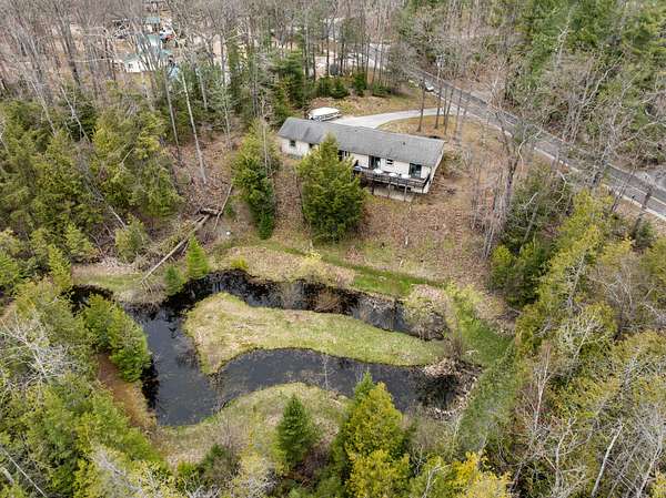 4.33 Acres of Land with Home for Sale in Indian River, Michigan