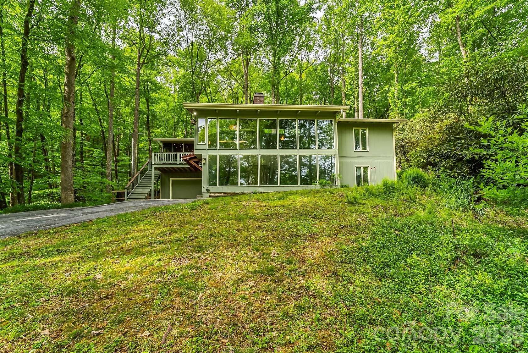 7.68 Acres of Land with Home for Sale in Brevard, North Carolina