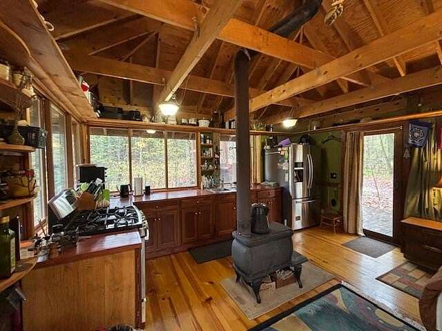 10.3 Acres of Recreational Land with Home for Sale in Mancelona, Michigan