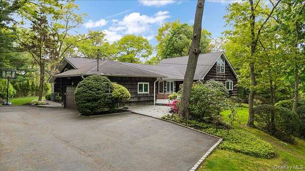 1.59 Acres of Land with Home for Sale in Melville, New York