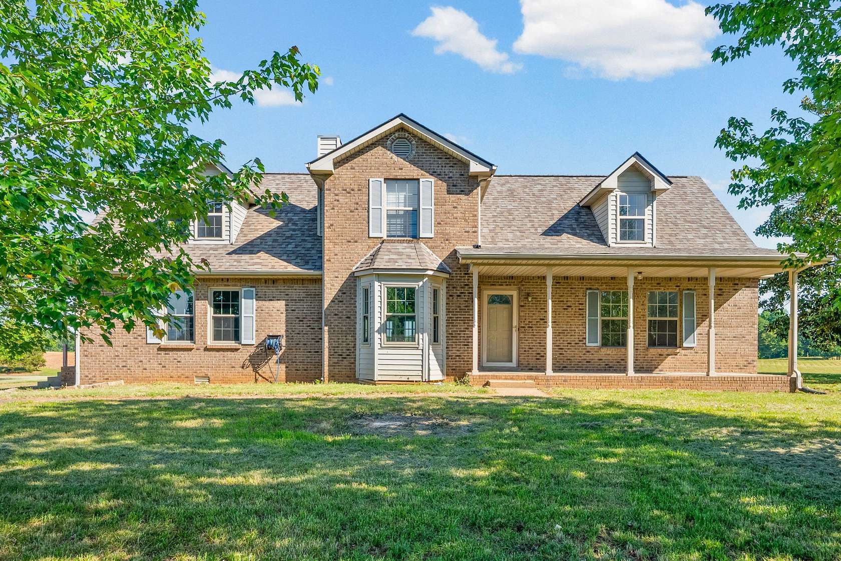 6.18 Acres of Land with Home for Sale in Adams, Tennessee
