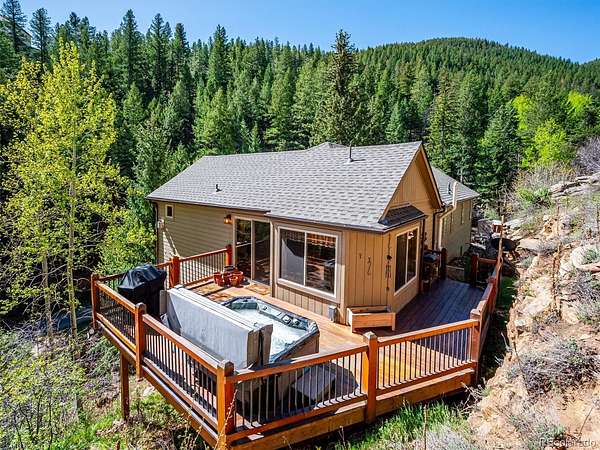 2.4 Acres of Land with Home for Sale in Evergreen, Colorado