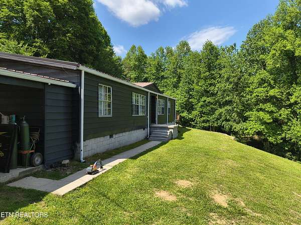 2.35 Acres of Land with Home for Sale in Pioneer, Tennessee