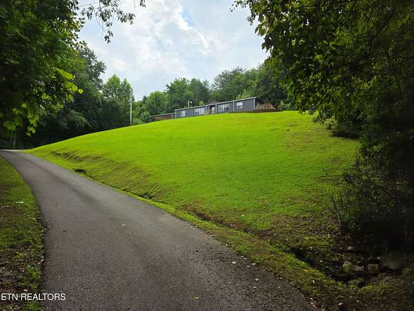 2.35 Acres of Land with Home for Sale in Pioneer, Tennessee
