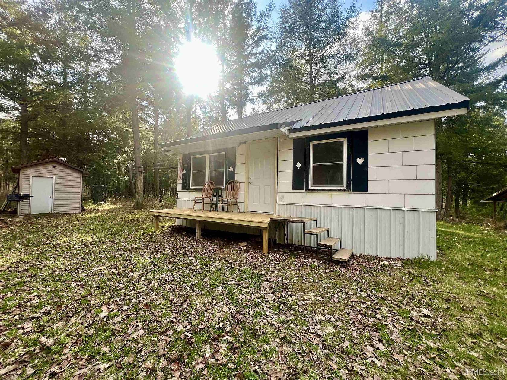 14.4 Acres of Recreational Land with Home for Sale in Bark River, Michigan