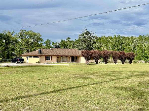 7.1 Acres of Land with Home for Sale in Perry, Florida
