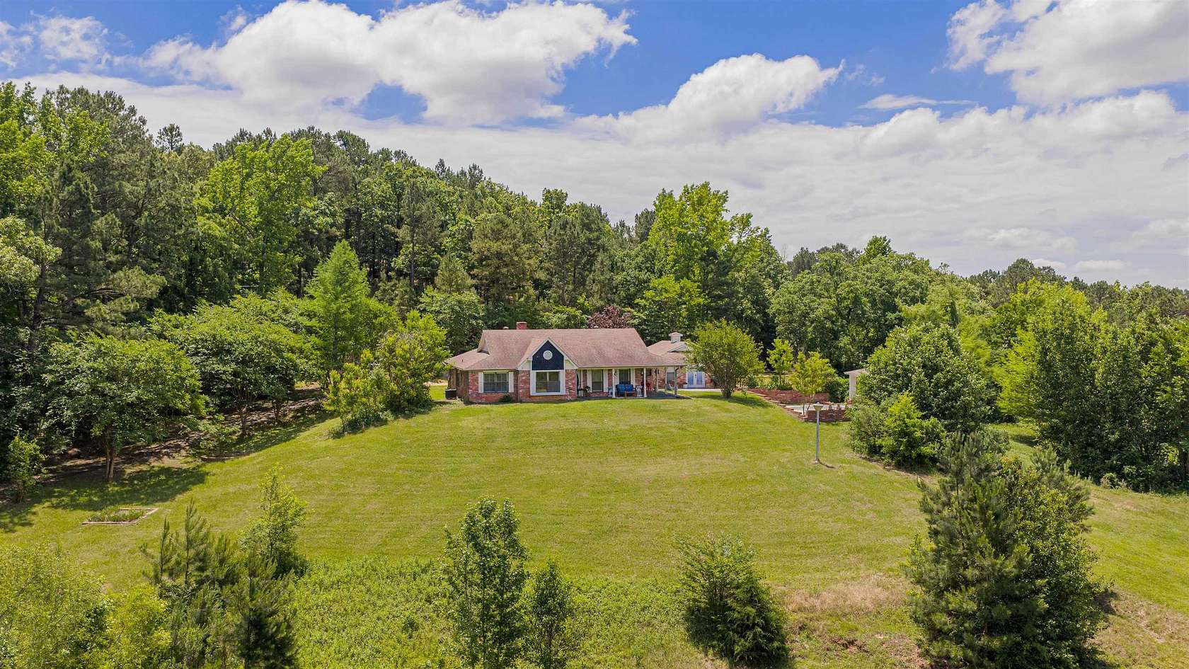58.7 Acres of Recreational Land with Home for Sale in Big Sandy, Texas