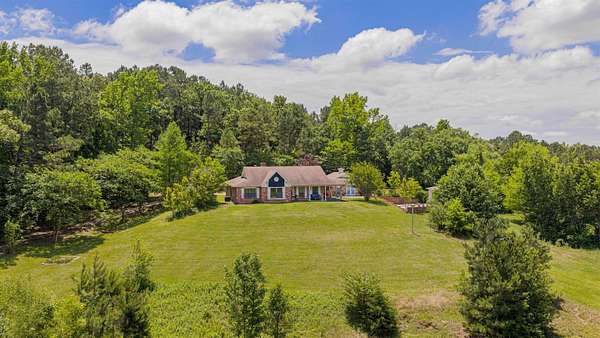 58.7 Acres of Recreational Land with Home for Sale in Big Sandy, Texas