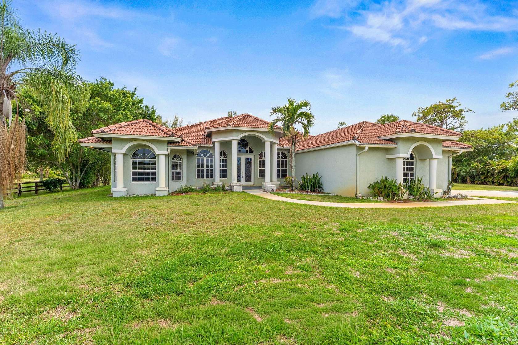 5 Acres of Land with Home for Sale in Loxahatchee Groves, Florida