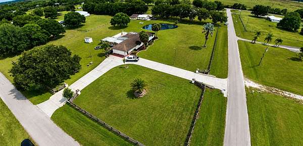 2.5 Acres of Land with Home for Sale in Okeechobee, Florida