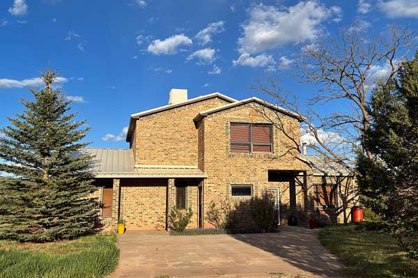 5 Acres of Land with Home for Sale in Sandia Park, New Mexico