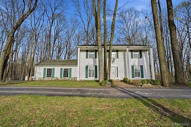 3.89 Acres of Land with Home for Sale in Salem Township, Michigan