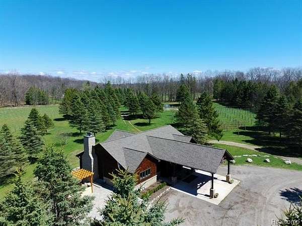 82.2 Acres of Land with Home for Sale in Metamora Township, Michigan