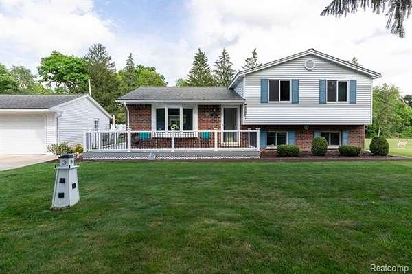 1.75 Acres of Land with Home for Sale in Salem Township, Michigan