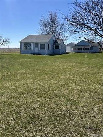 1.88 Acres of Land with Home for Sale in Merritt Township, Michigan
