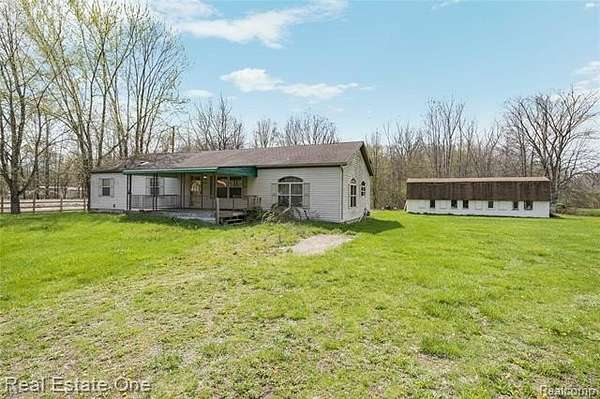 9.79 Acres of Land with Home for Sale in Sumpter Township, Michigan