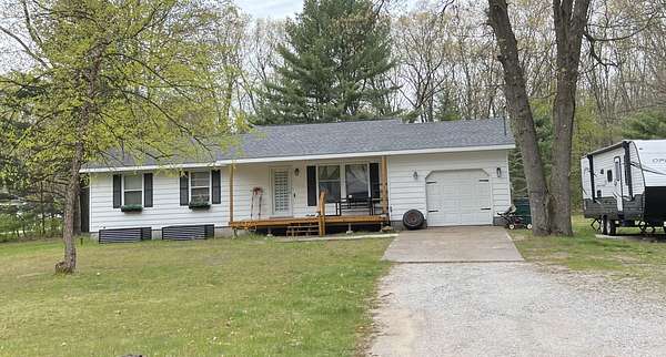 1.76 Acres of Land with Home for Sale in Twin Lake, Michigan