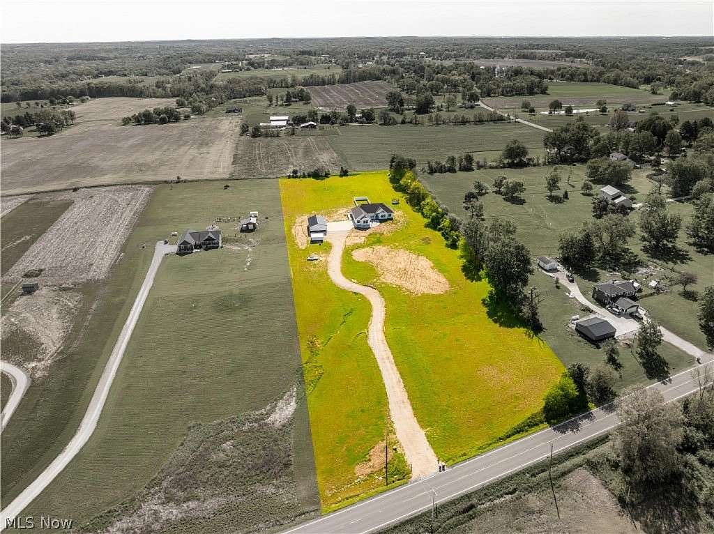 5.76 Acres of Land with Home for Sale in North Lawrence, Ohio