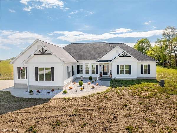 5.76 Acres of Land with Home for Sale in North Lawrence, Ohio
