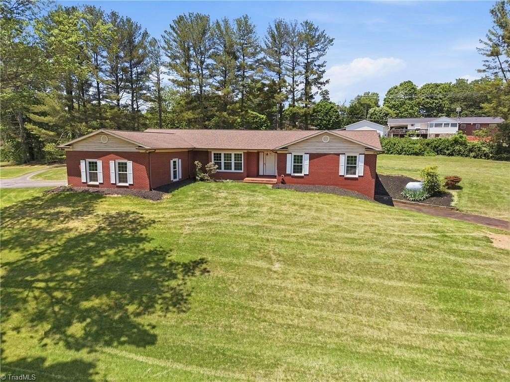 1.5 Acres of Land with Home for Sale in Millers Creek, North Carolina
