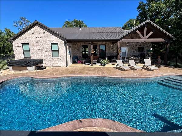 15.8 Acres of Land with Home for Sale in Omaha, Arkansas