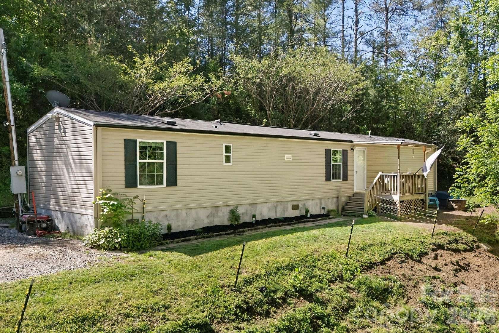 1.76 Acres of Land with Home for Sale in Alexander, North Carolina