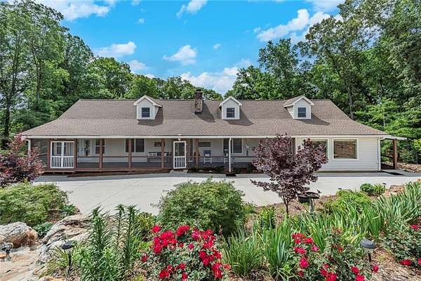 16 Acres of Land with Home for Sale in Ball Ground, Georgia