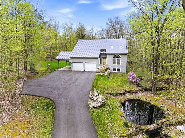11 Acres of Recreational Land with Home for Sale in Milton, Vermont