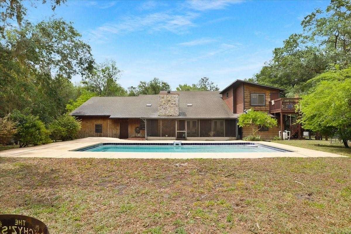 9.48 Acres of Land with Home for Sale in Micanopy, Florida