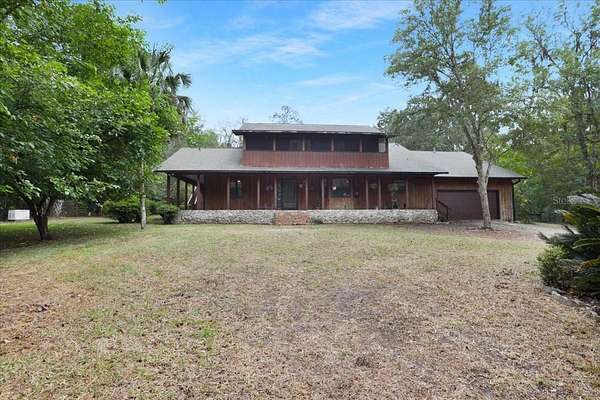 9.48 Acres of Land with Home for Sale in Micanopy, Florida